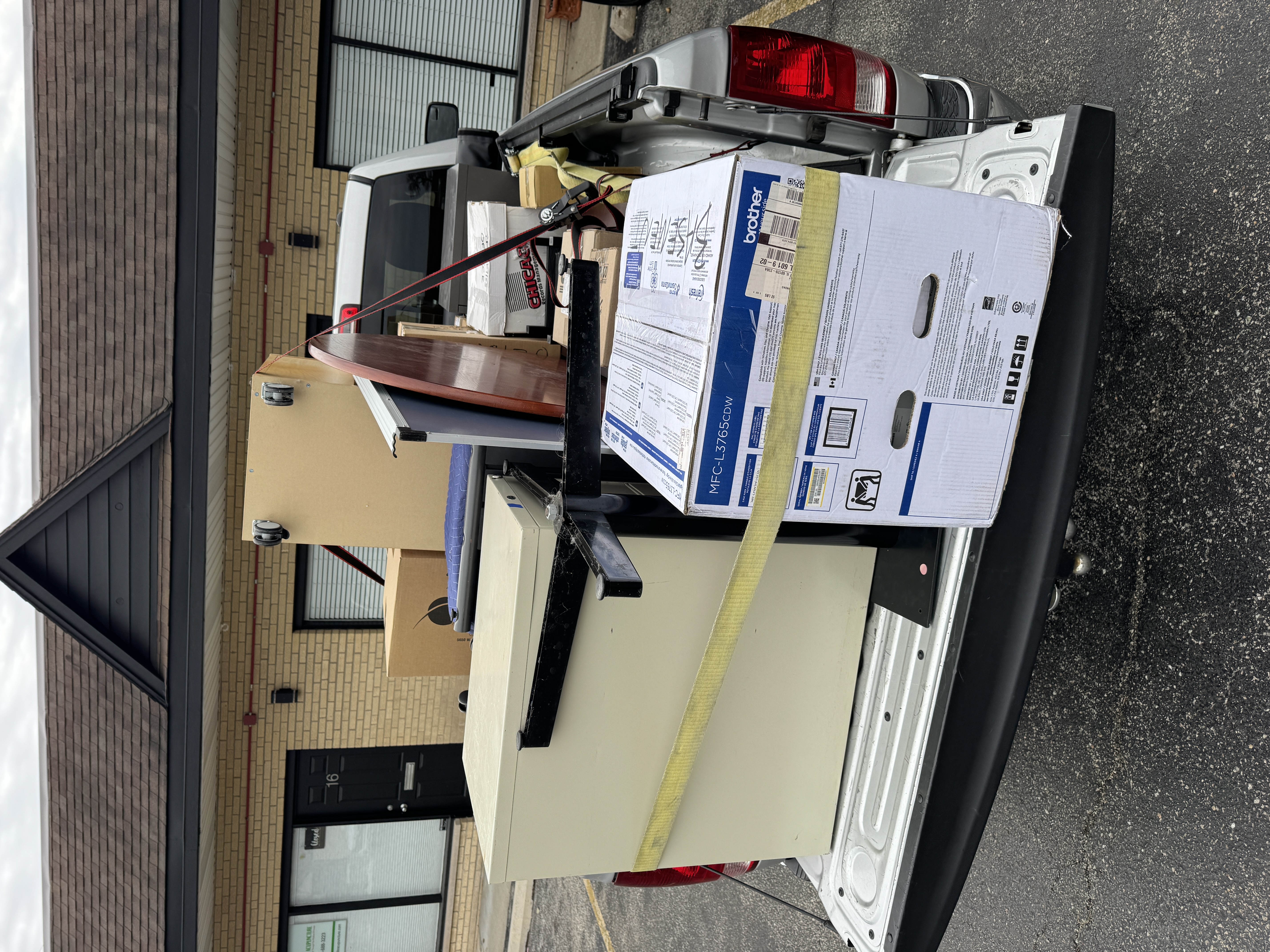 Truck bed packed with secured supplies